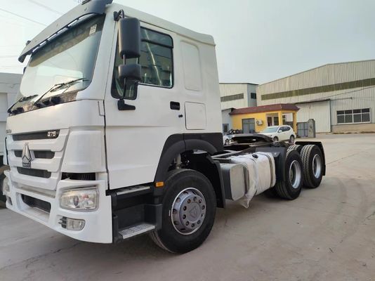Camión tractor sinotruk blanco HOWO 6×4 de manejo a mano derecha para asientos y rendimiento de minería