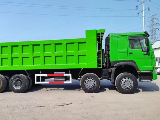 6×4 rueda motriz 12 ruedas color verde Sinotruk HOWO 8*4 camión de basura camión de segunda mano
