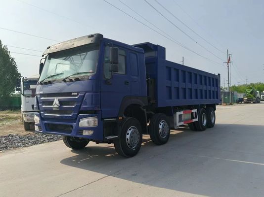 Sinotruk HOWO 8*4 de segunda mano azul con capacidad de motor de 6-8L y manejo a mano derecha