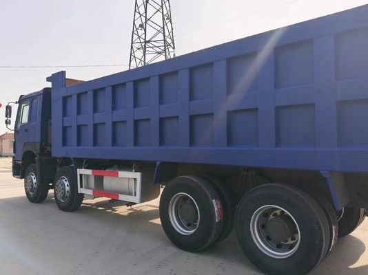 Sinotruk HOWO 8*4 de segunda mano azul con capacidad de motor de 6-8L y manejo a mano derecha