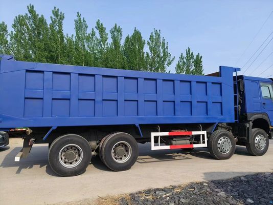 Sinotruk HOWO 8*4 de segunda mano azul con capacidad de motor de 6-8L y manejo a mano derecha
