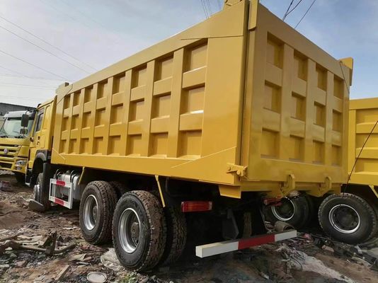 Diseño de neumáticos radiales Sinotruck HOWO 6*4 camión de descarga amarillo con transmisión manual